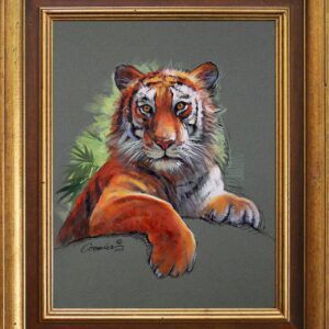 Tiger painting in a wooden frame.
