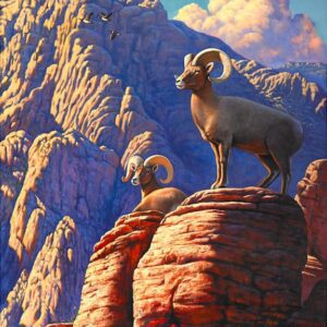 Bighorn sheep standing on red rocky cliffs.