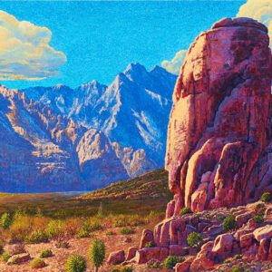 Colorful desert landscape with mountains and sheep.