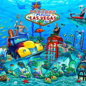 Underwater Las Vegas scene with mermaids and fish.